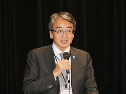 The Special Advisor Yamamoto greets the attendees